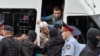 Kazakhstan - Police officers detain opposition supporters during a protest against presidential election, in Almaty, Kazakhstan, June 9, 2019. REUTERS/Mariya Gordeyeva